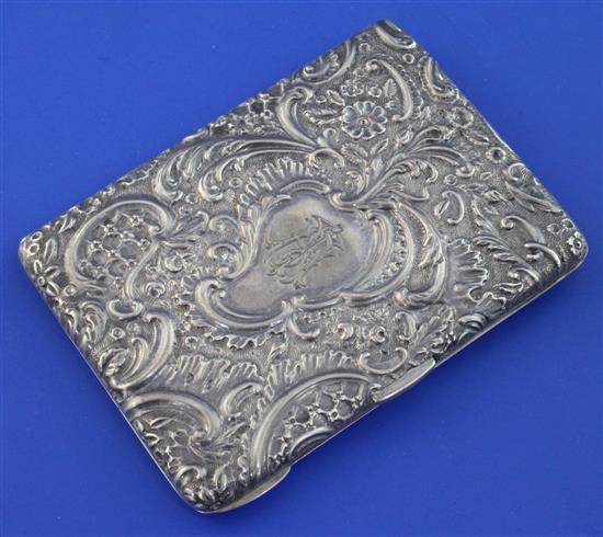 A late Victorian repousse silver card purse, 4in.